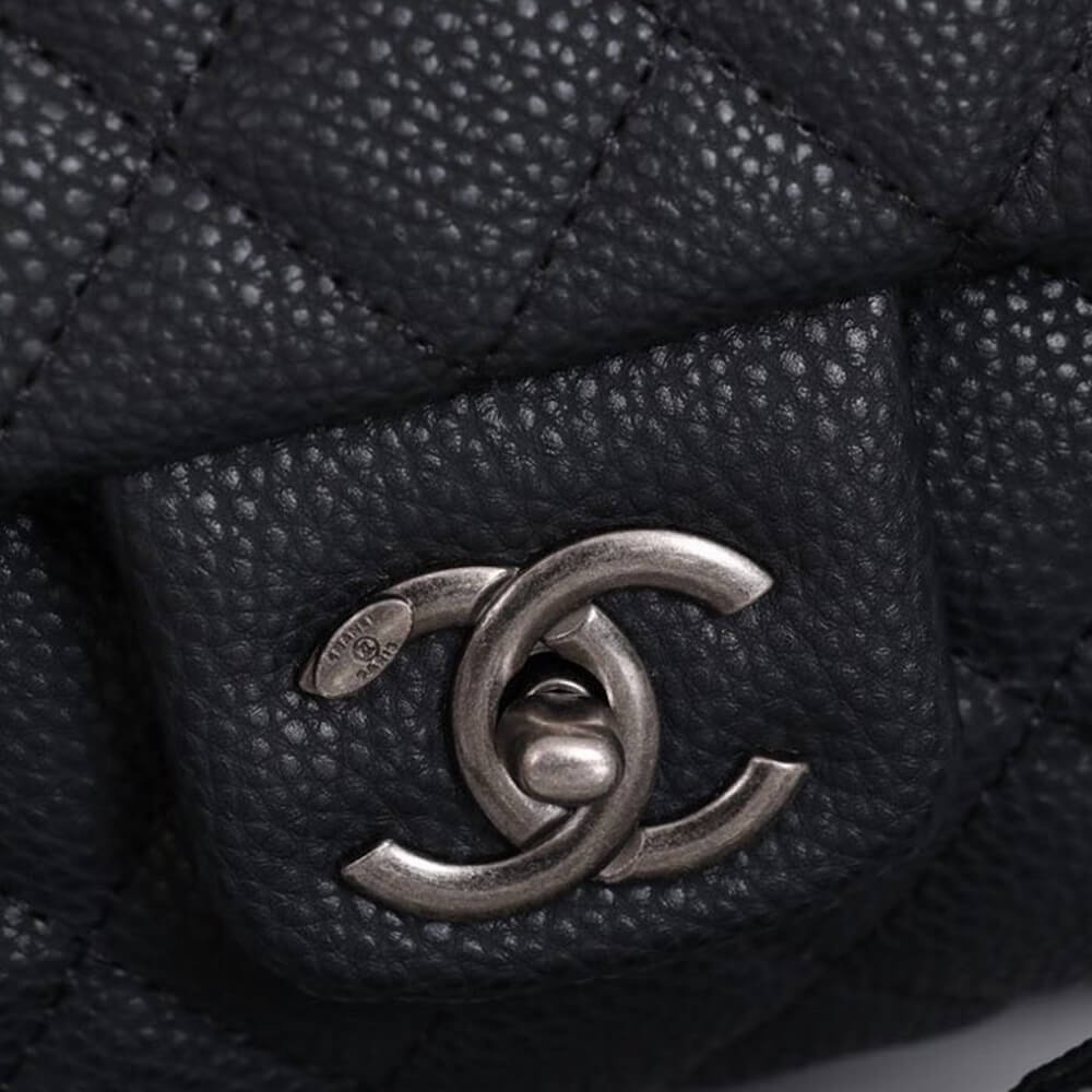 Ch**el travel flap bag black