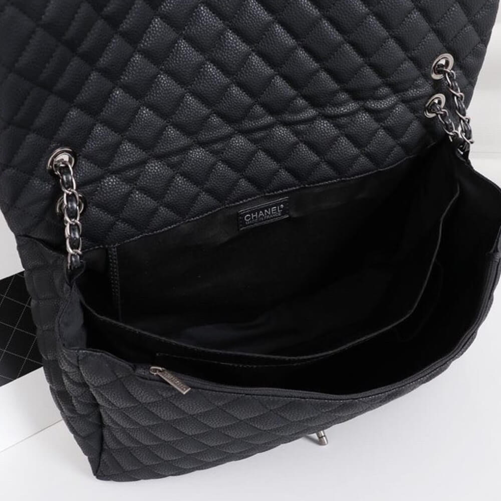 Ch**el travel flap bag black