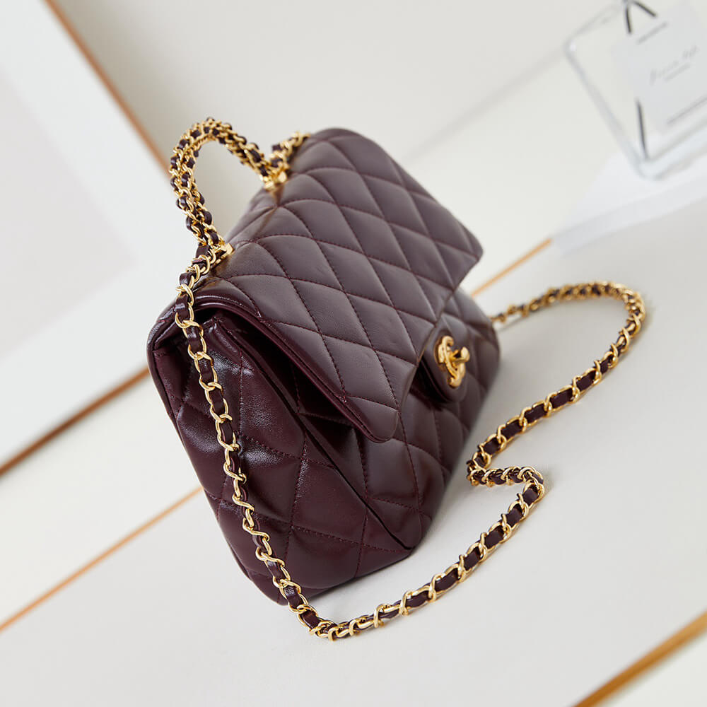 Ch**el flap bag with top handle