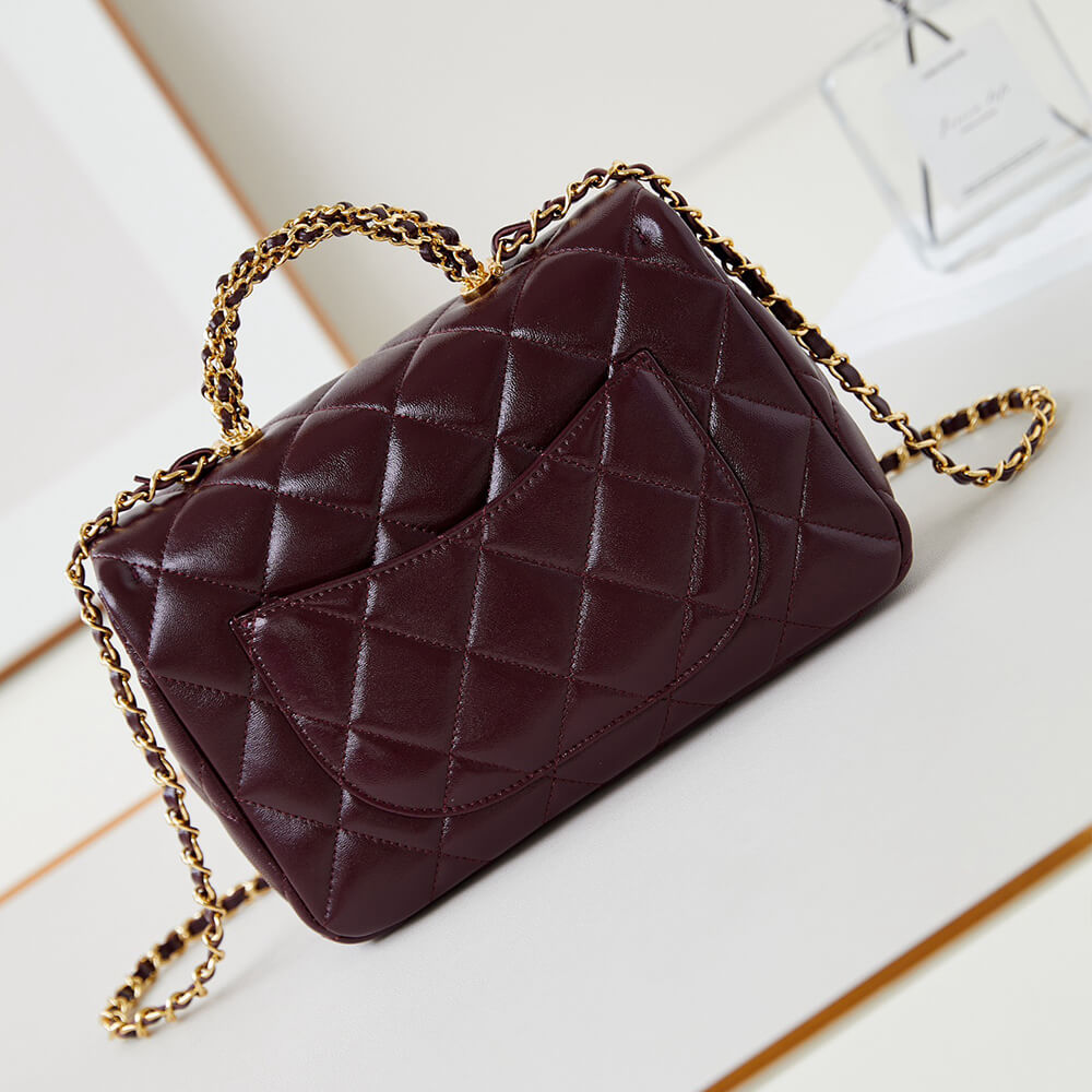 Ch**el flap bag with top handle