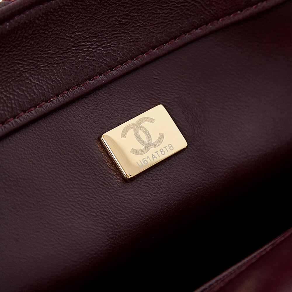 Ch**el flap bag with top handle